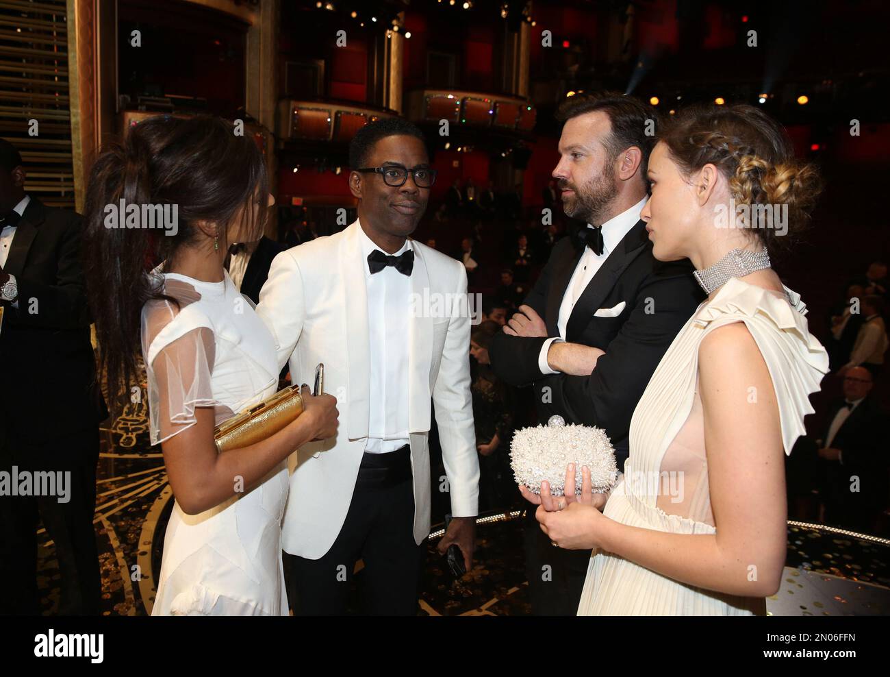 Megalyn Echikunwoke, from left, Chris Rock, Jason Sudeikis and Olivia Wilde  appear backstage at the Oscars on Sunday, Feb. 28, 2016, at the Dolby  Theatre in Los Angeles. (Photo by Matt Sayles/Invision/AP, image size:1300x988