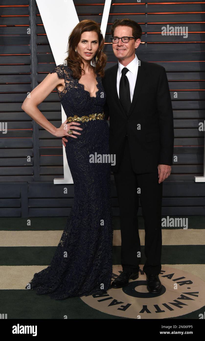 Desiree Gruber, left, and Kyle MacLachlan arrive at the Vanity Fair Oscar Party on Sunday, Feb