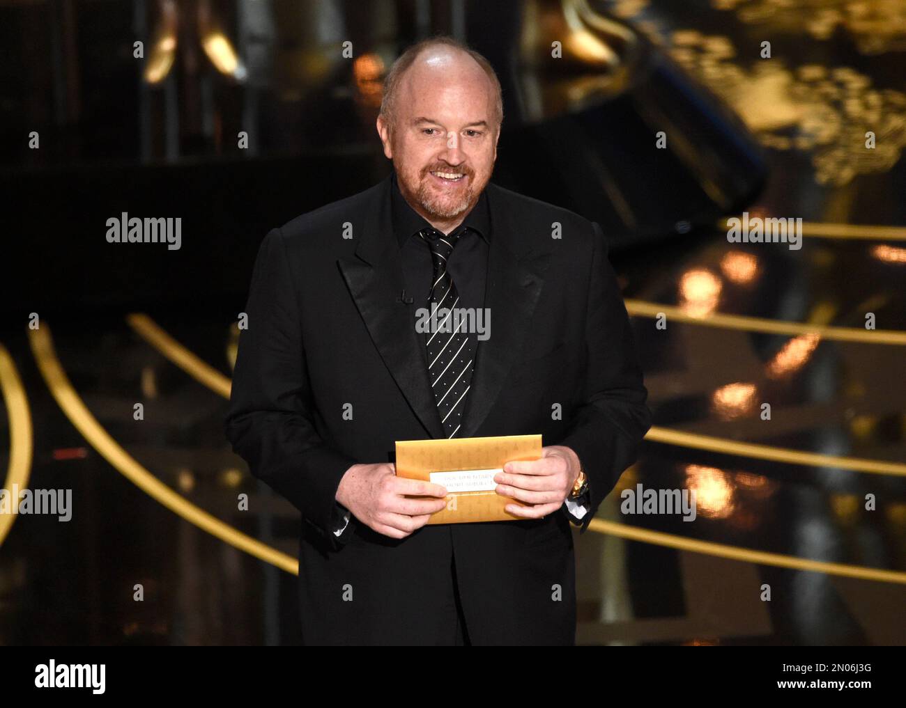 Louis C.K. presents the award for best documentary short at the Oscars on  Sunday, Feb. 28, 2016, at the Dolby Theatre in Los Angeles. (Photo by Chris  Pizzello/Invision/AP Stock Photo - Alamy