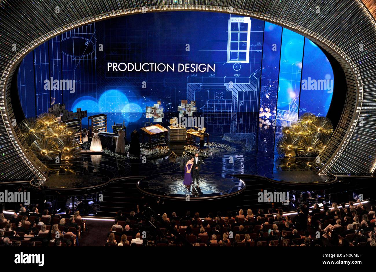 Tina Fey, left, and Steve Carell present the award for best production