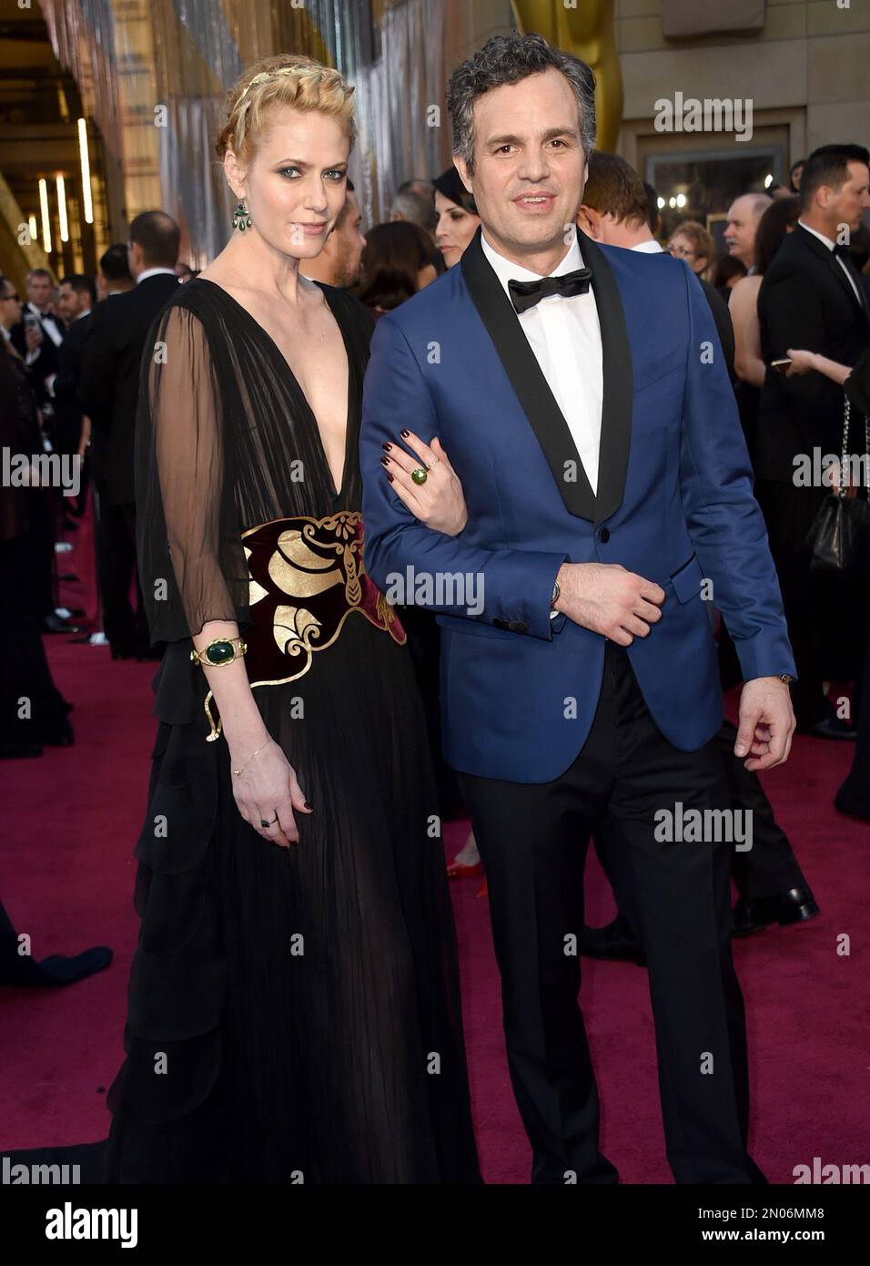 Sunrise Coigney, left, and Mark Ruffalo arrive at the Oscars on Sunday