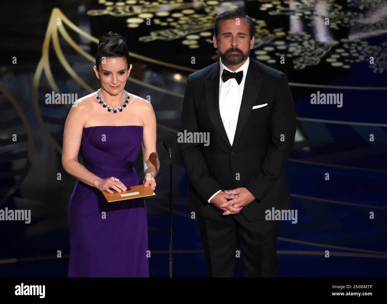 Tina Fey, left, and Steve Carell present the award for best production
