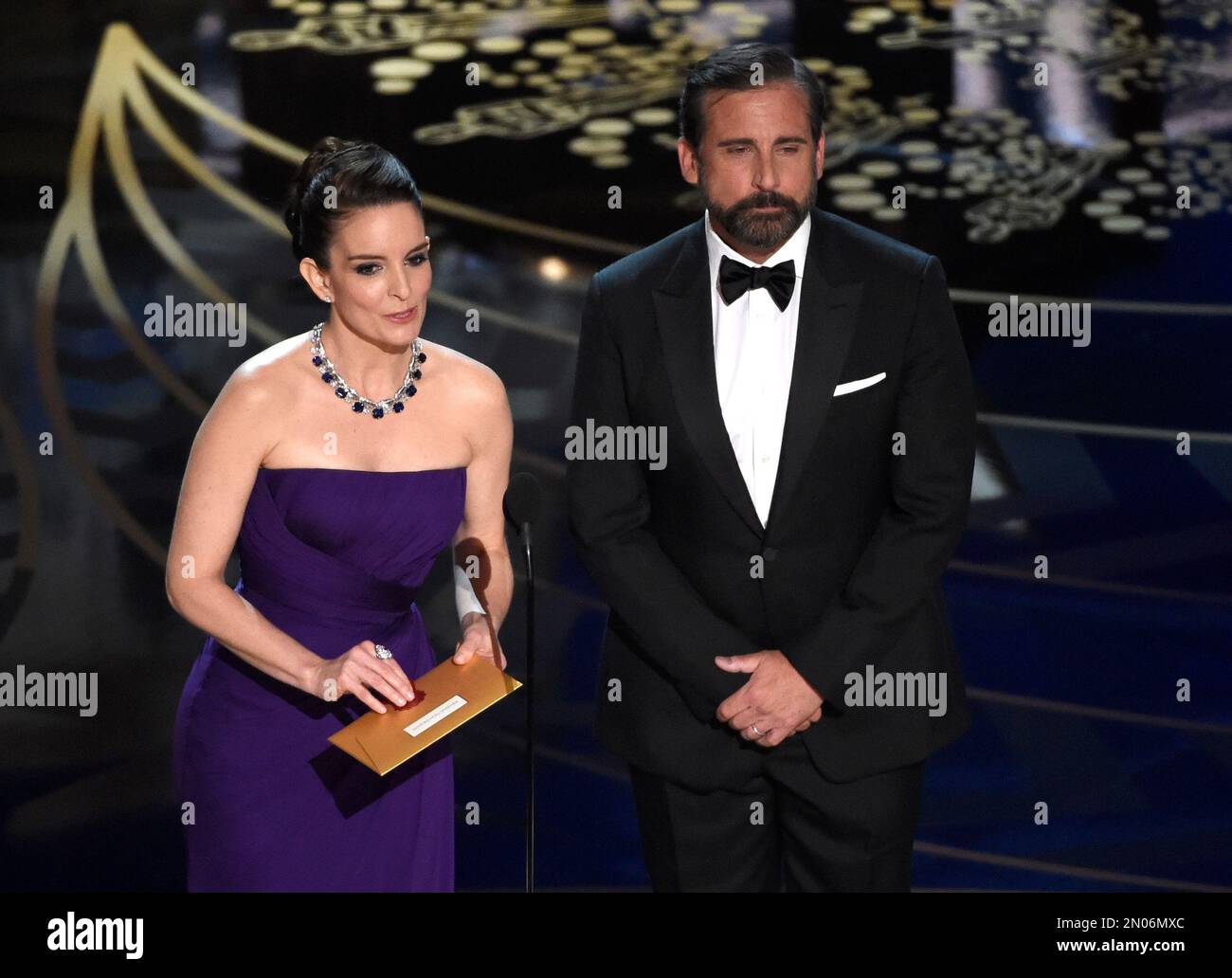 Tina Fey, left, and Steve Carell present the award for best production(01)
