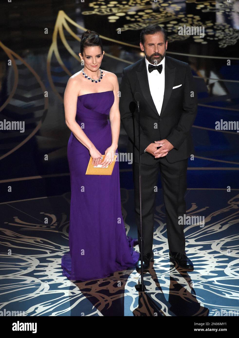 Tina Fey, left, and Steve Carell present the award for best production