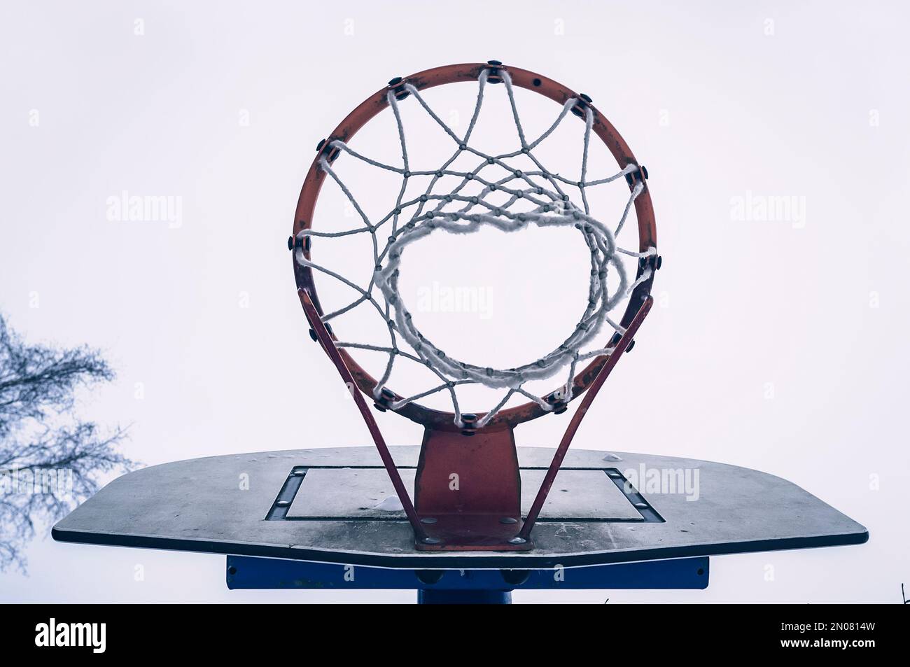 Basketball hoop with net on sky background Stock Photo Alamy