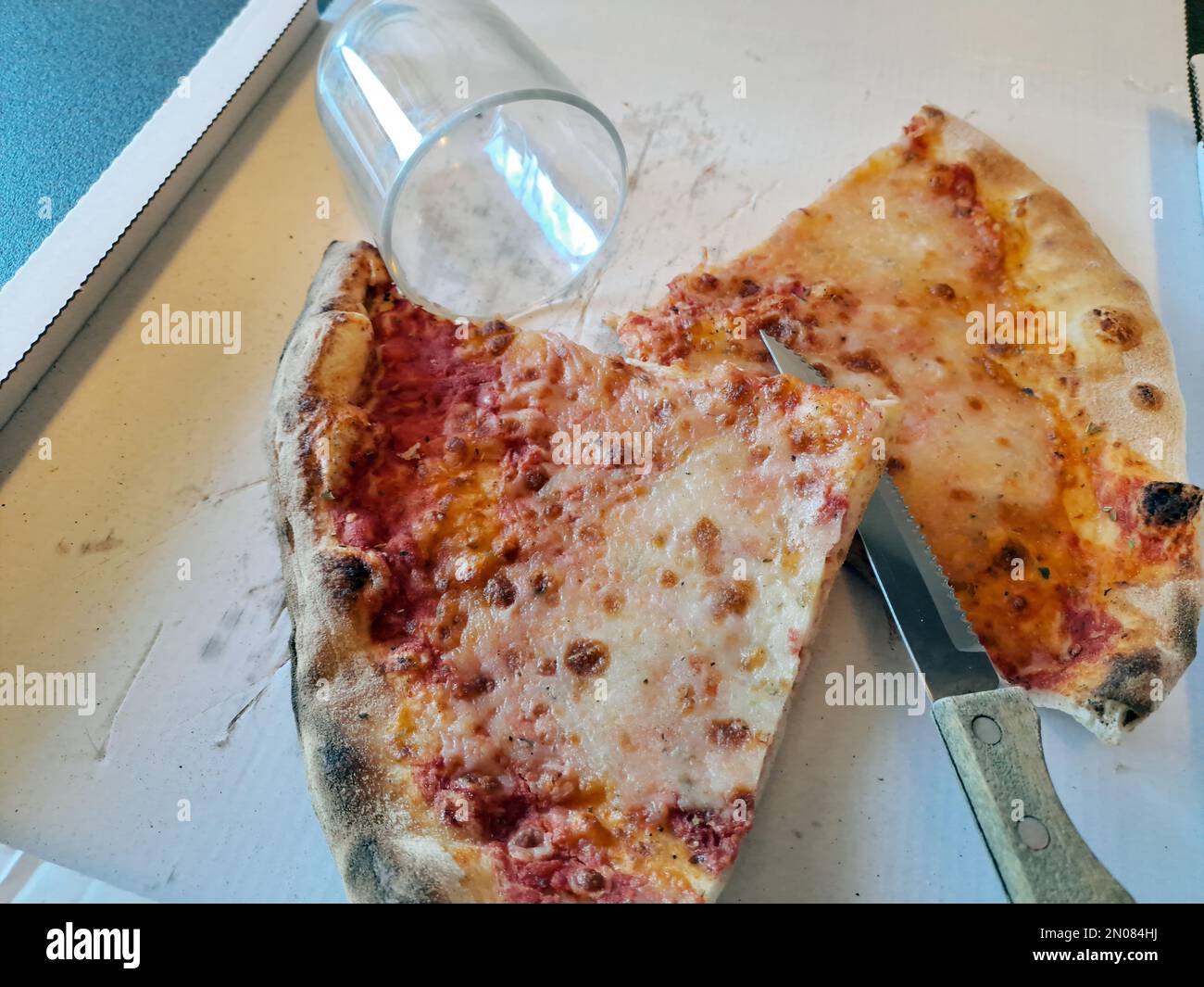 Slice of cheese pizza close-up real life Stock Photo