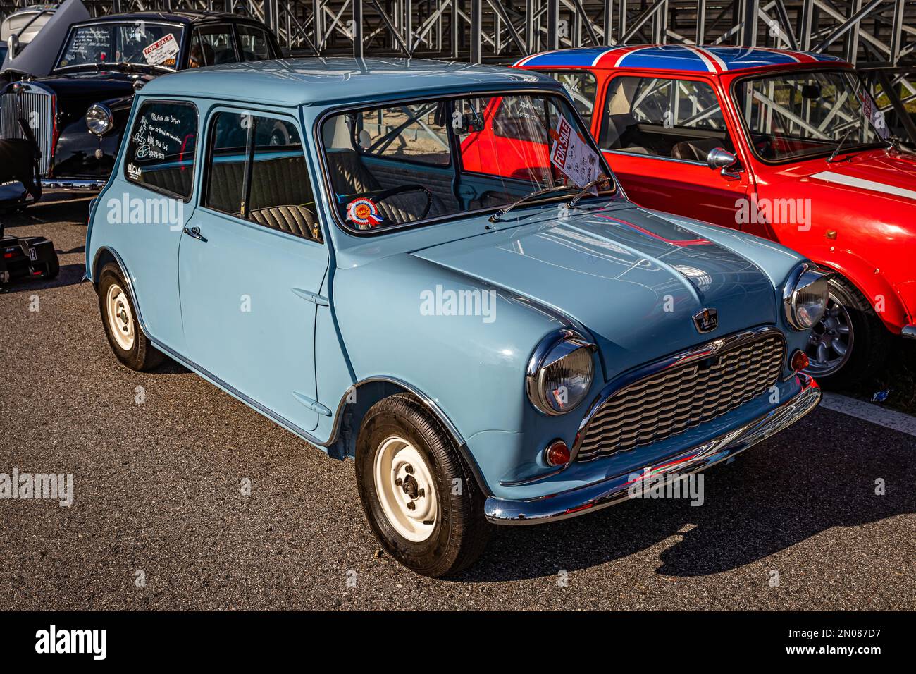 Daytona Beach, FL - November 26, 2022: High perspective front corner view of a 1960 Austin Mini Seven Super Deluxe Coupe at a local car show. Stock Photo