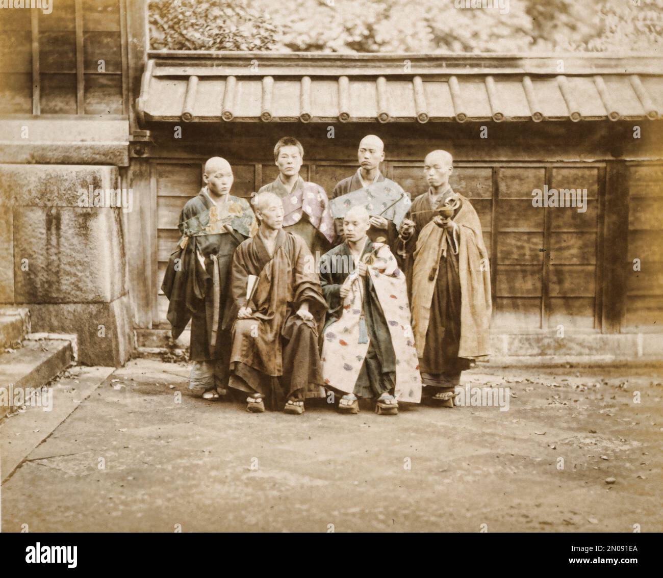 A photograph of a group of Japanese monks, published in Views & Costumes of Japan by Stillfried and Andersen (Yokohama, 1877). Stock Photo