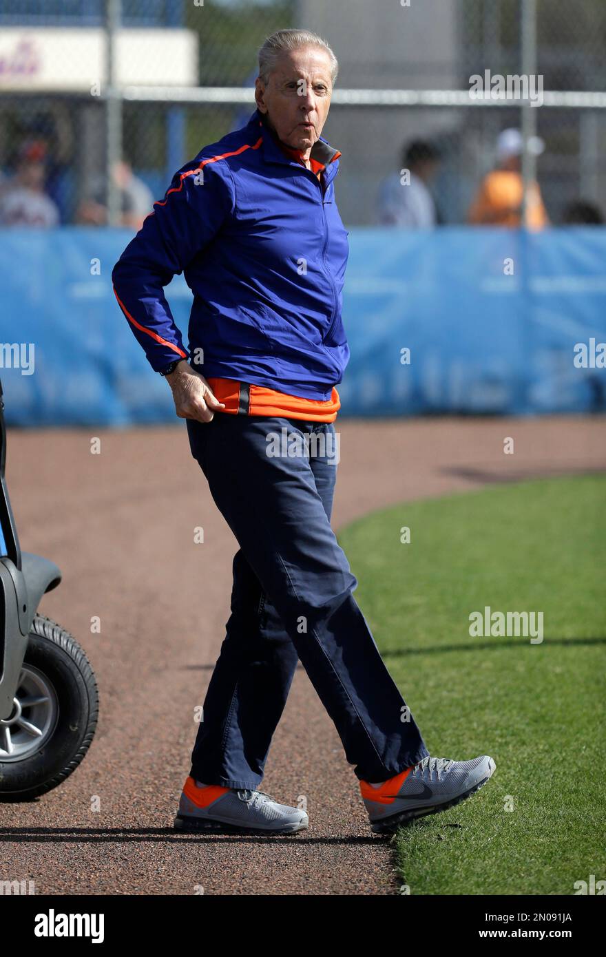 New York Mets owner Fred Wilpon walks onto a field during spring