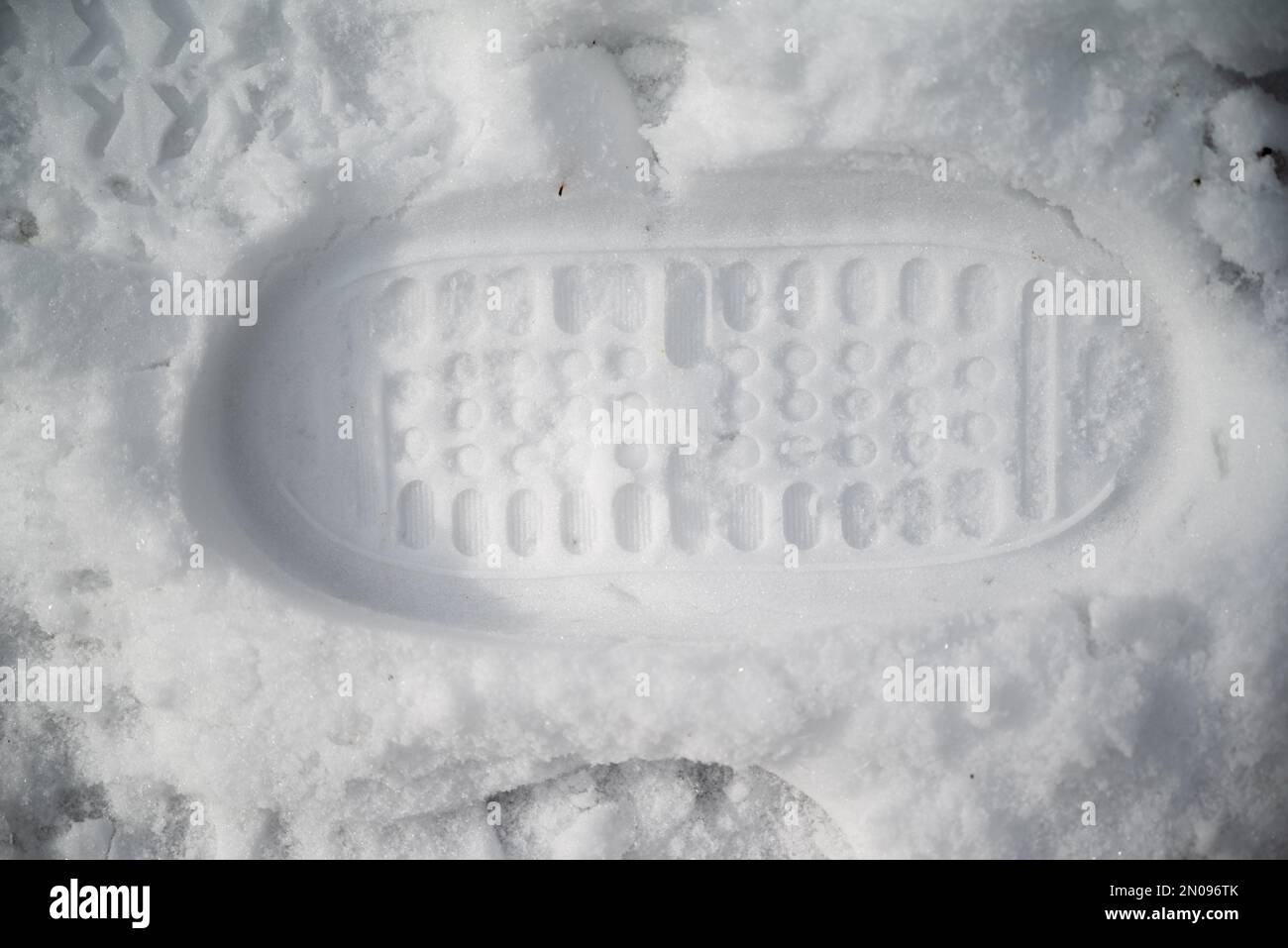 Footsteps in snow.Human footprints in snow.Winter trail and tracking