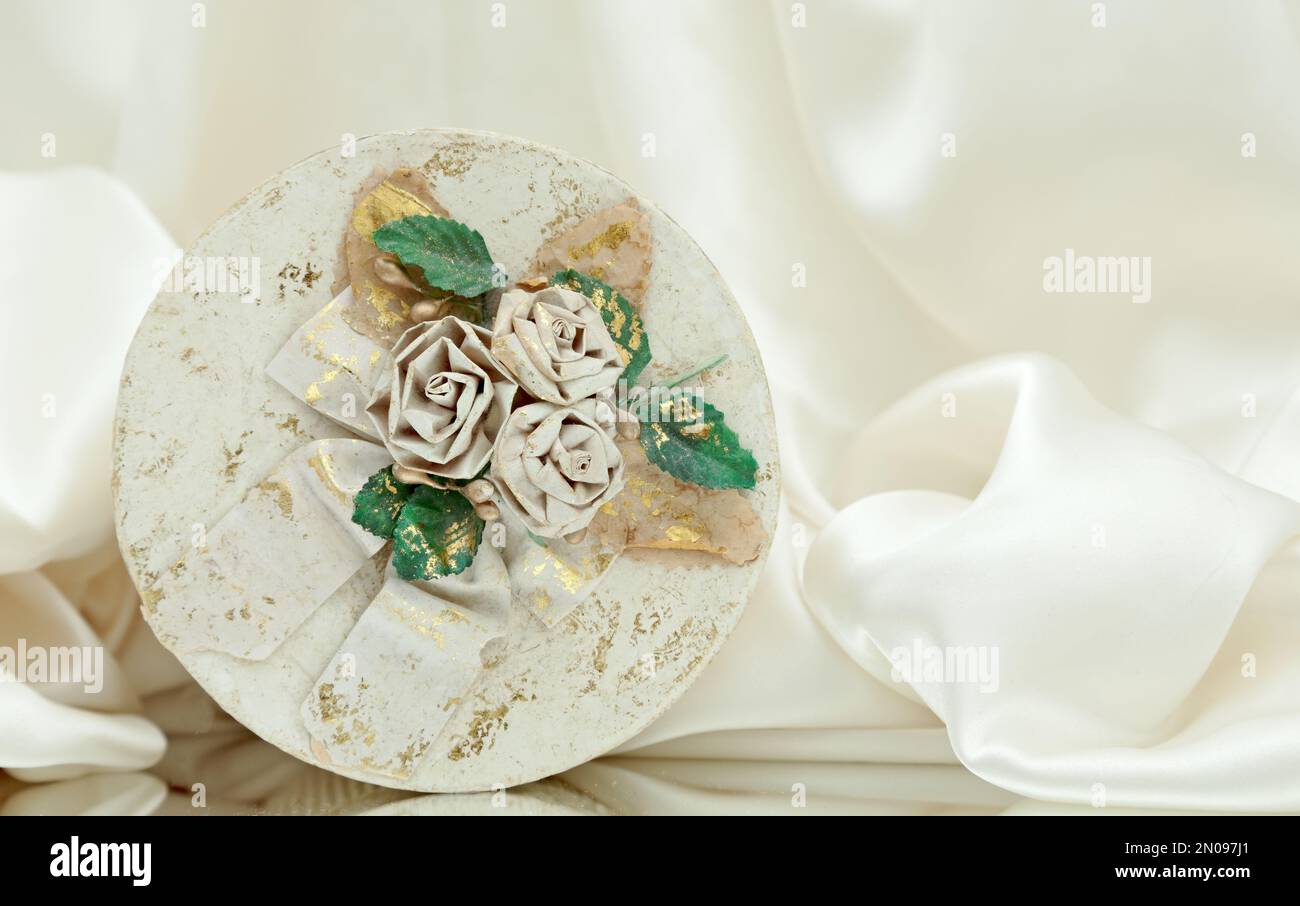 White cardboard jewel case with paper roses Stock Photo Alamy