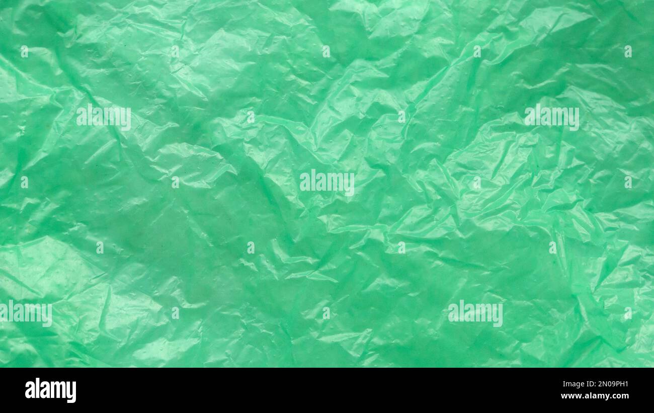 Green and crumpled plastic bag background and texture Stock Photo Alamy
