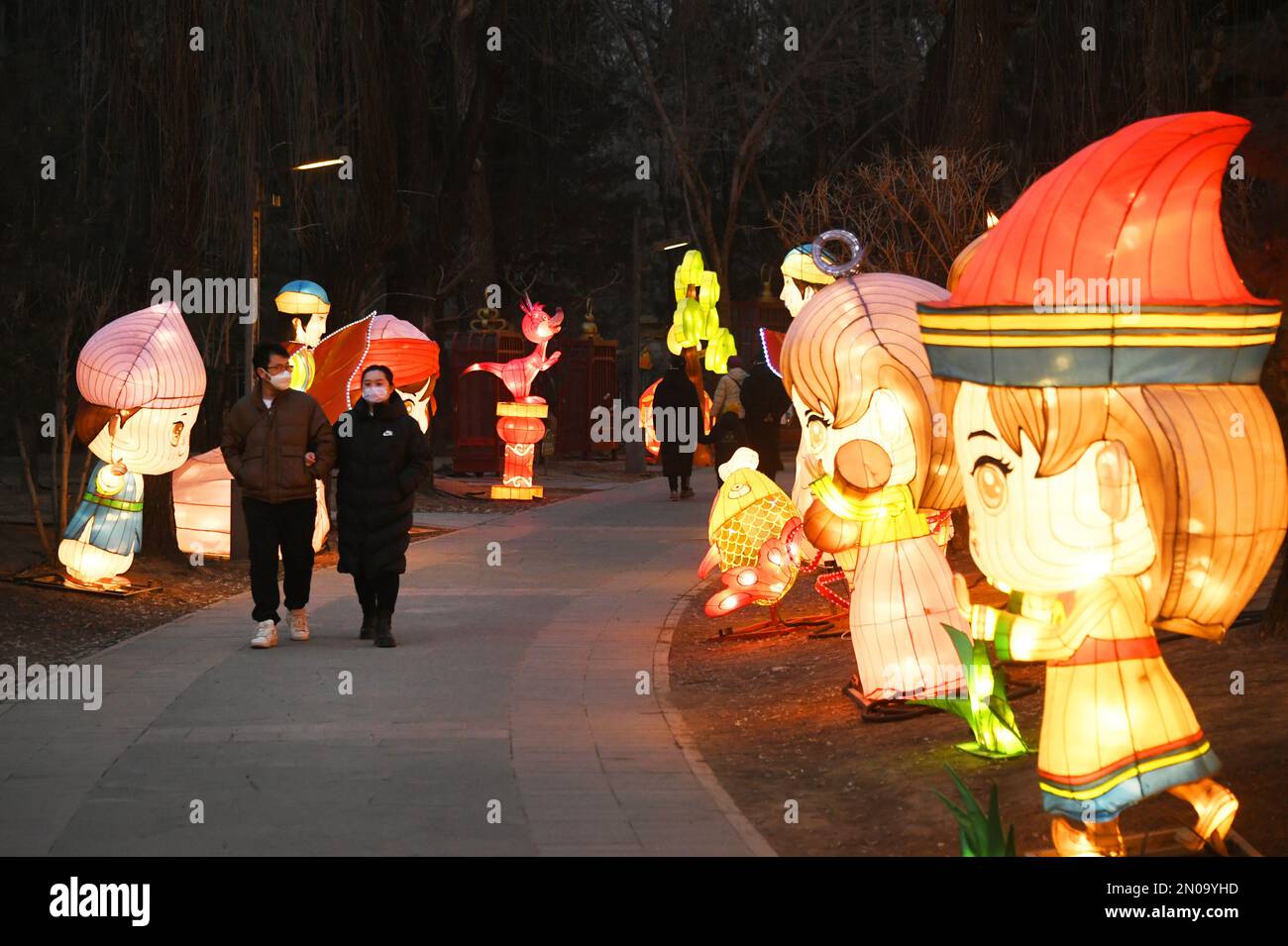 Beijing, China. 5th Feb, 2023. Tourists visit a light show at Nangong