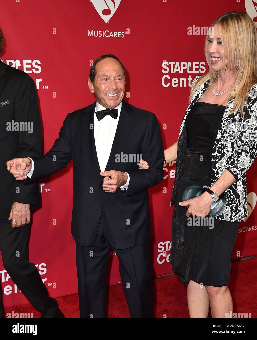 Paul Anka, left, and and Lisa Pemberton arrive at the MusiCares Person ...