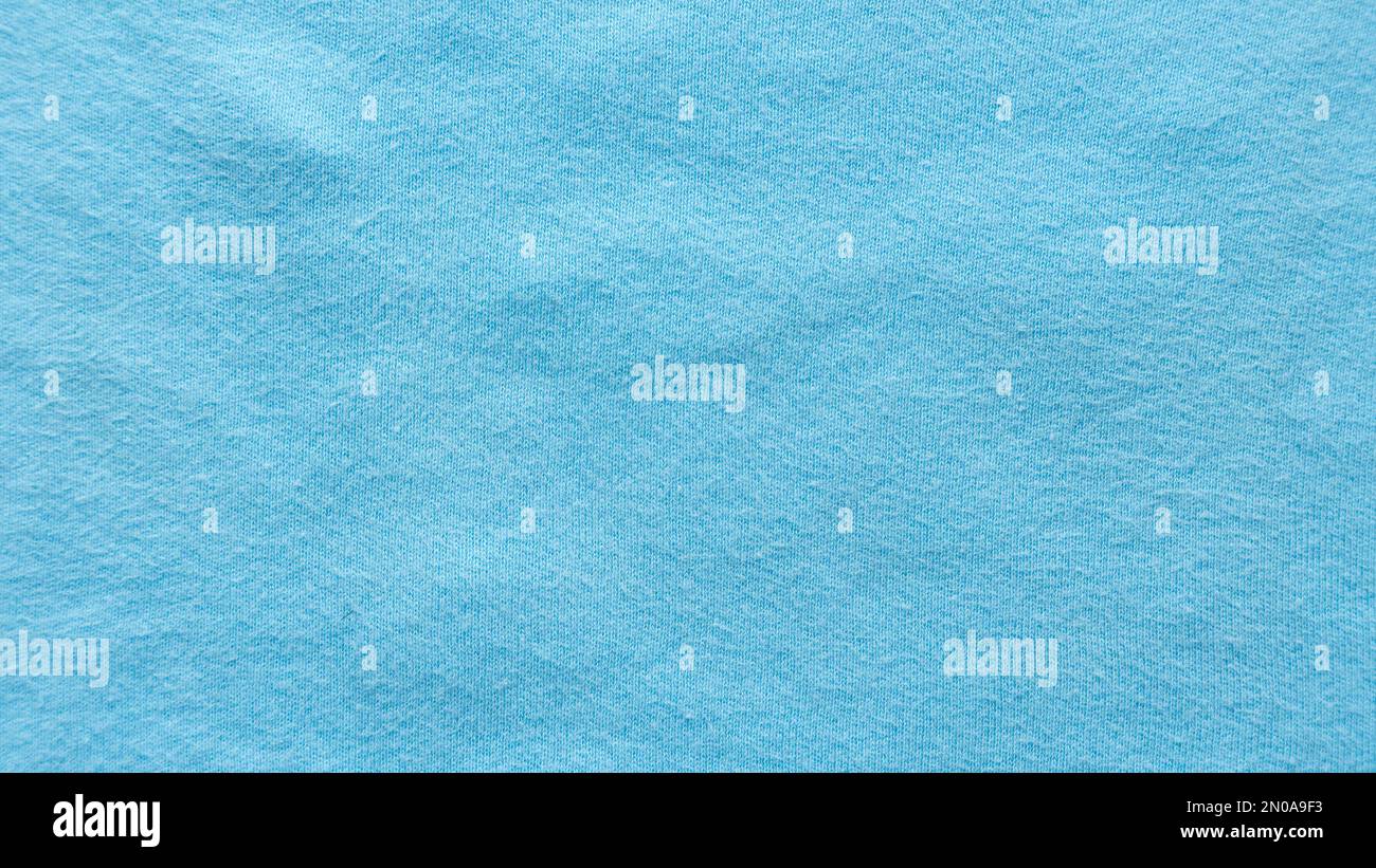 Textile and texture template. Blue cotton cloth fabric. Background. Stock Photo