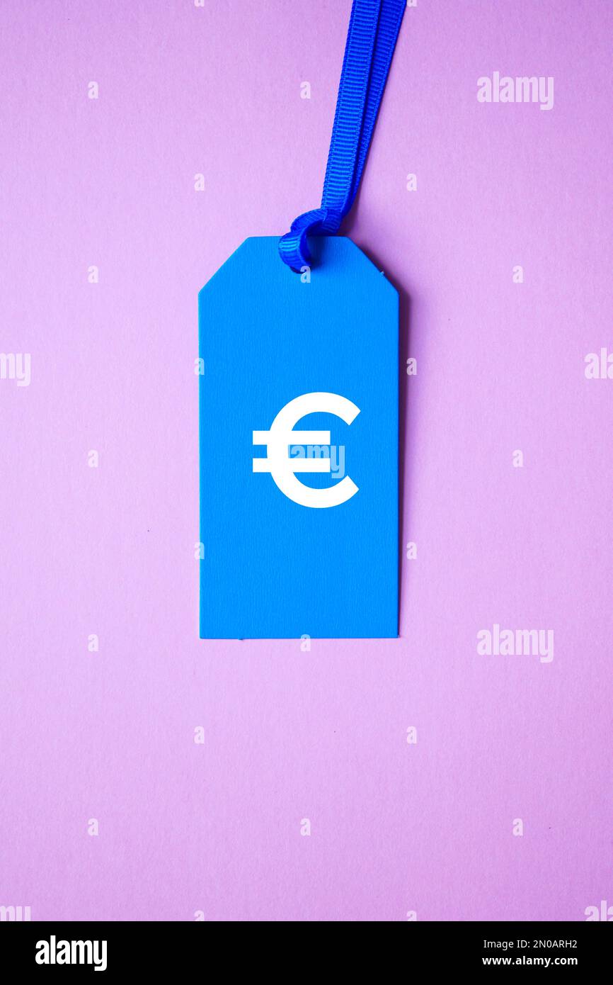 euro sign on the blue price tag for sales Stock Photo Alamy