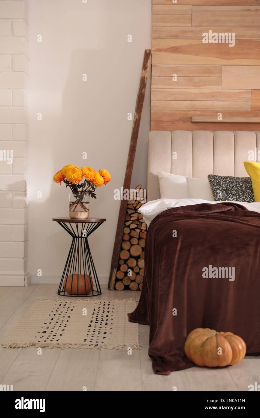 Cozy bedroom interior inspired by autumn color scheme Stock Photo - Alamy