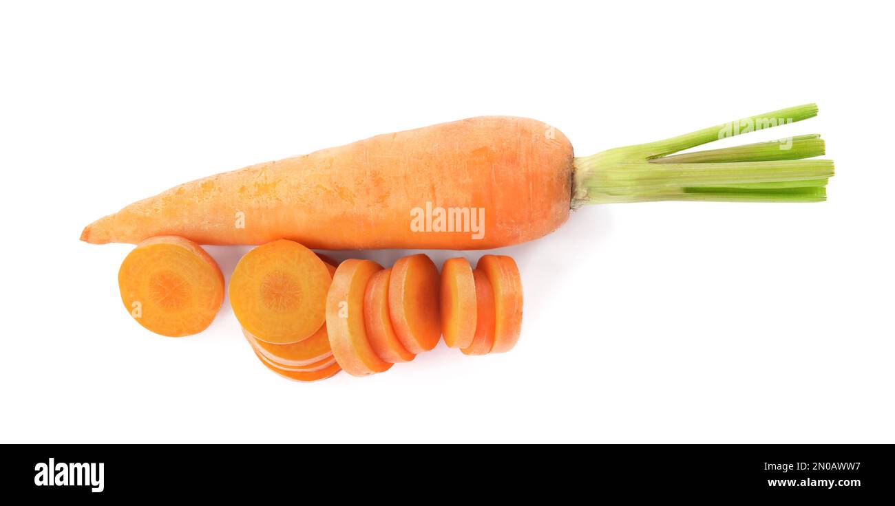 Whole and cut ripe carrots isolated on white, top view Stock Photo - Alamy