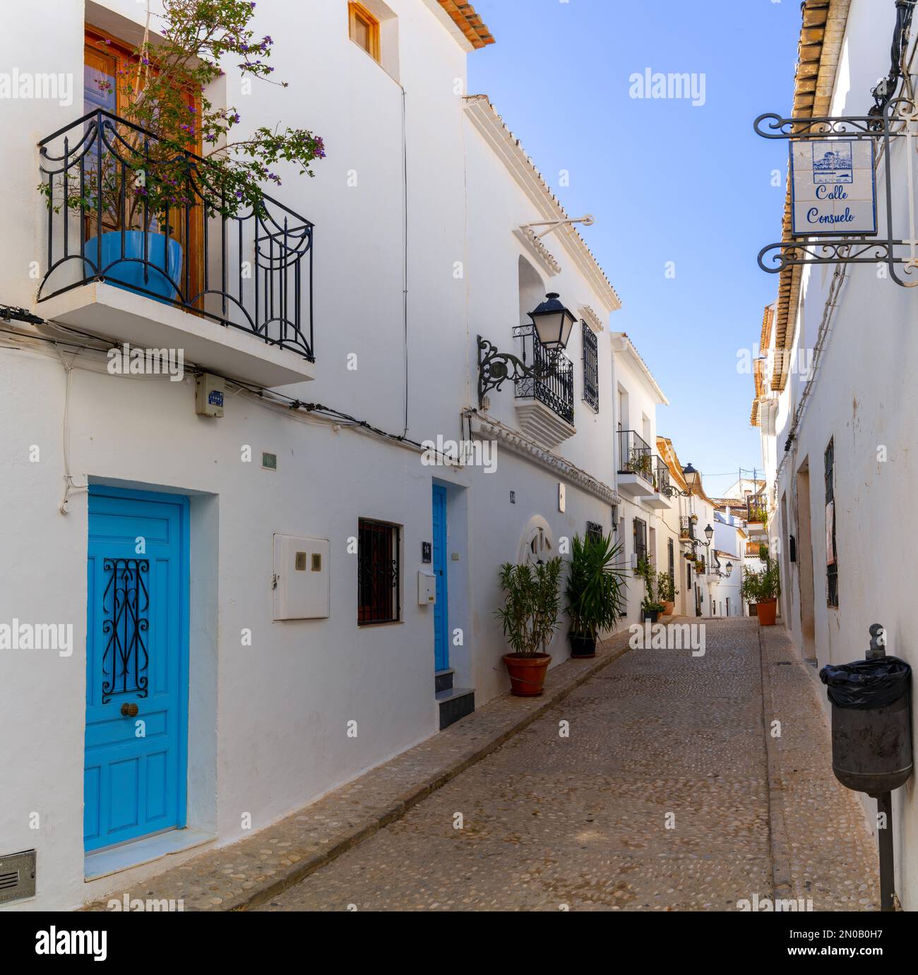 Altea Spain 3 February 2023 Narrow Street With Whitewashed House altea-spain-3-february-2023-narrow-street-with-whitewashed-house