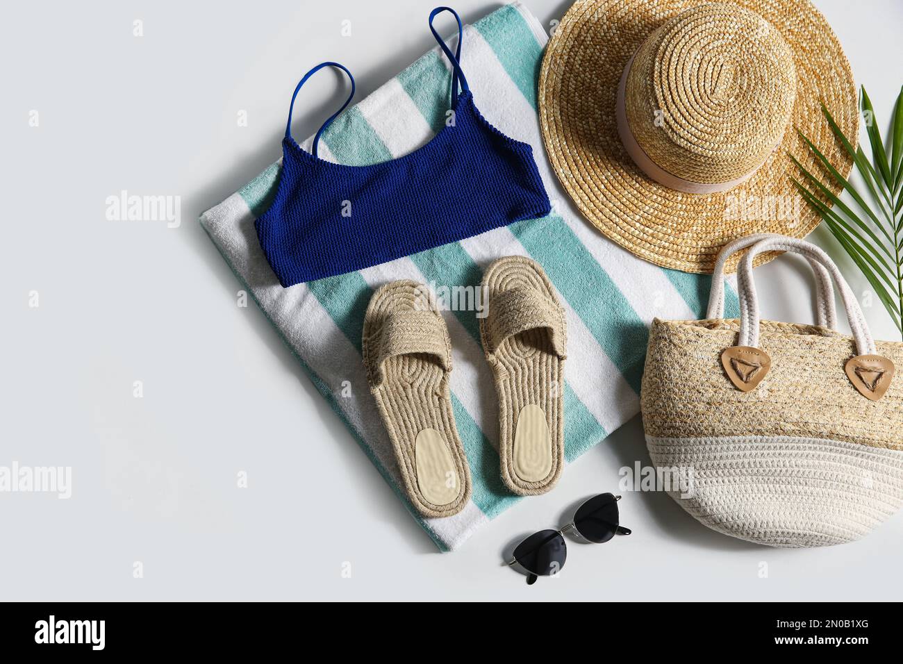 Composition with stylish beach accessories on white background, top view Stock Photo