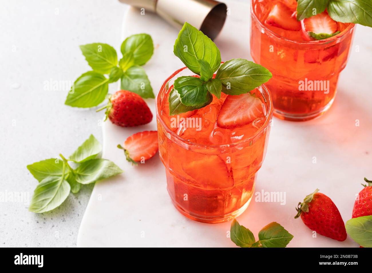 Strawberry basil cocktail or mocktail, cold refreshing summer drink Stock Photo