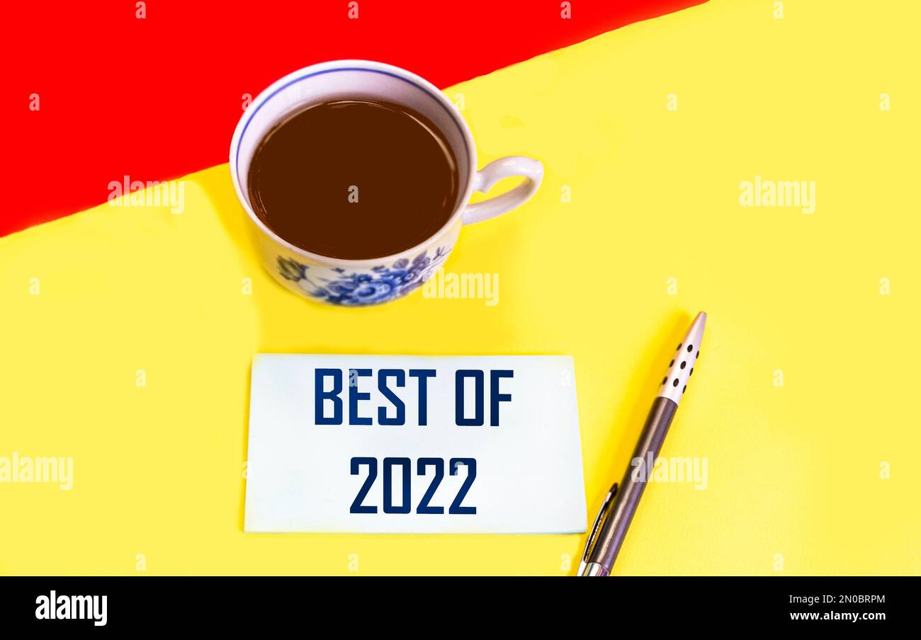 best of 2022 - handwriting on sticker and red yellow background, product or business review for the last year Stock Photo