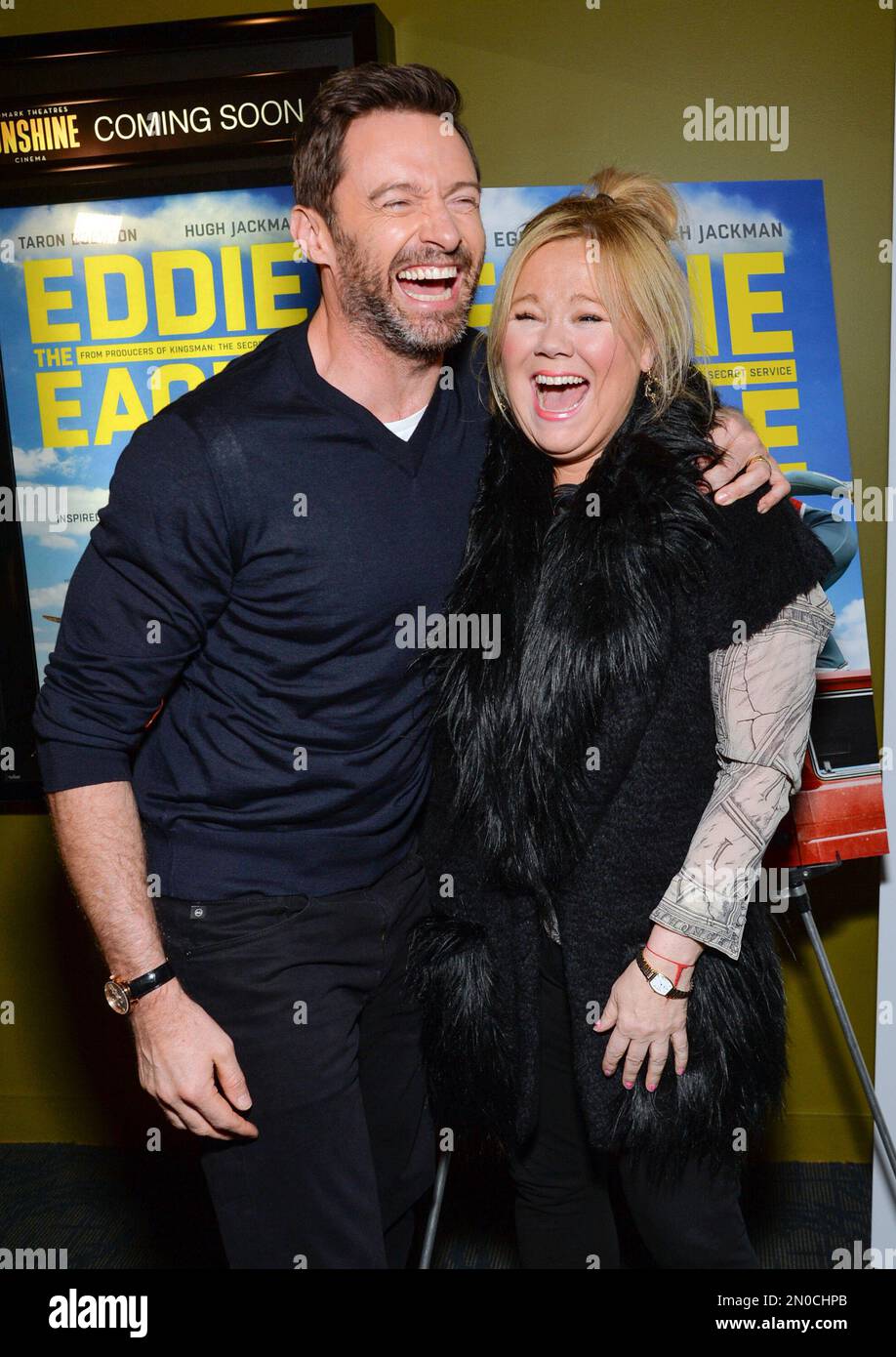 Actor Hugh Jackman, left, shares a laugh with actress Caroline Rhea at ...