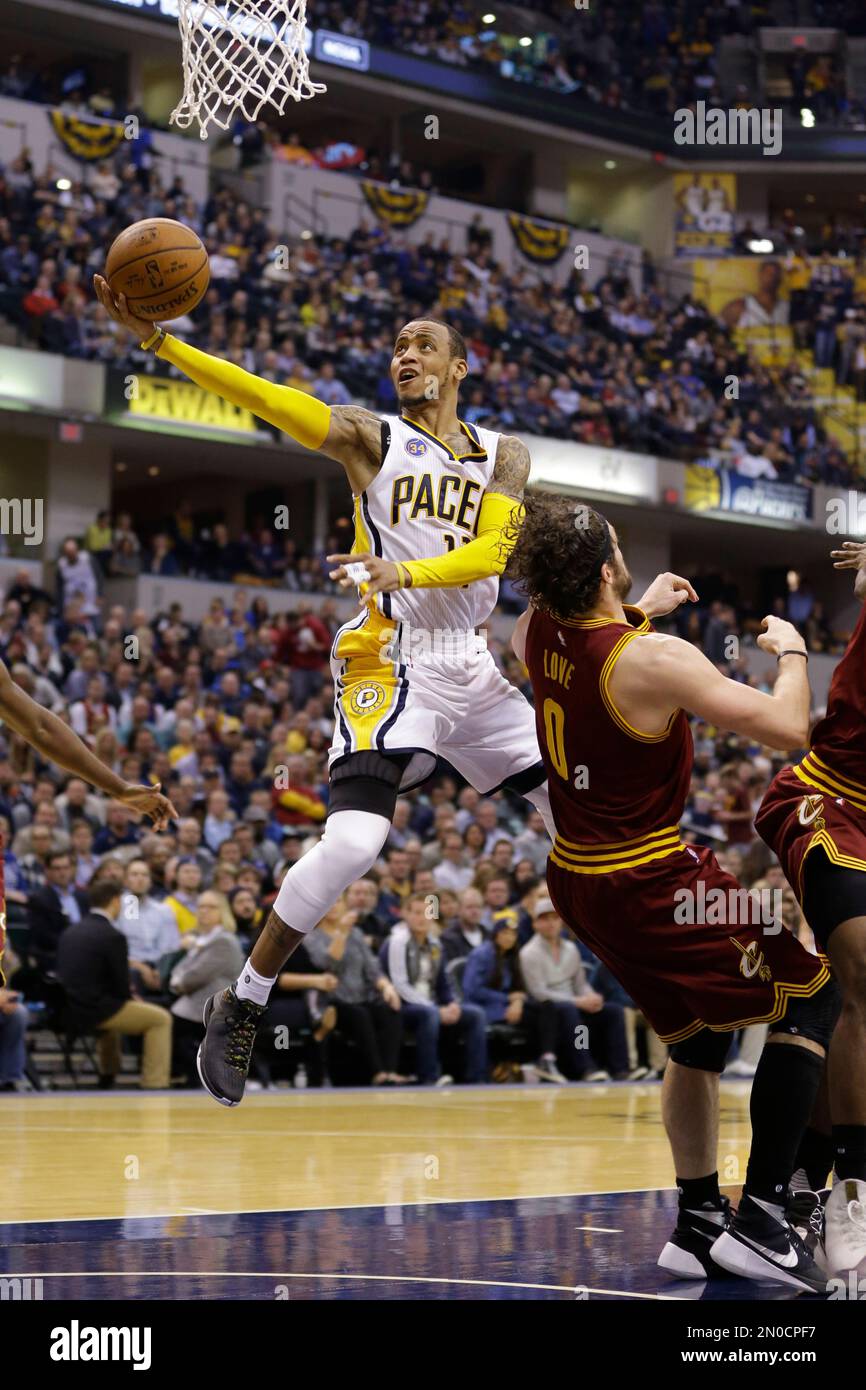 Cleveland Cavaliers forward Kevin Love (0) draws the charging foul from