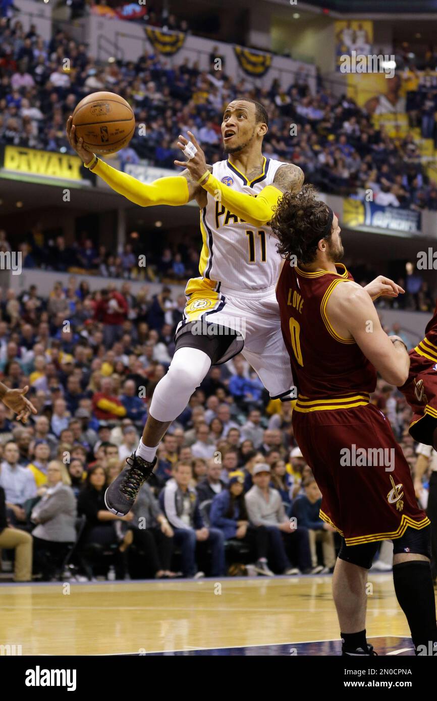 Cleveland Cavaliers forward Kevin Love (0) draws the charging foul from