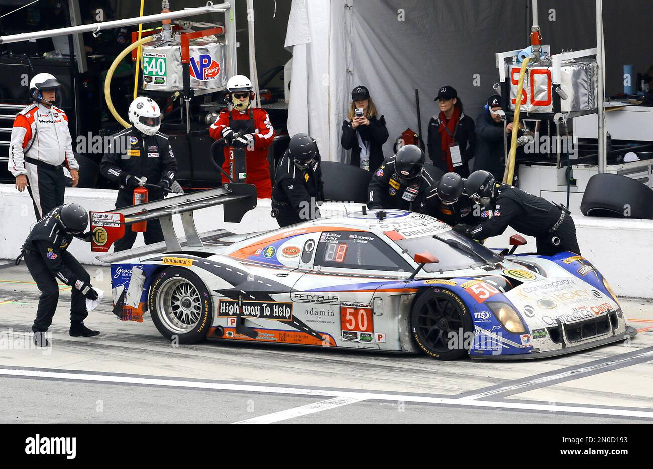 The BMW Riley DP makes a pit stop during the IMSA 24-hour auto race at ...