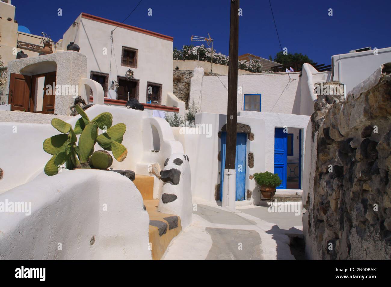 typical narrow alley in village Stock Photo