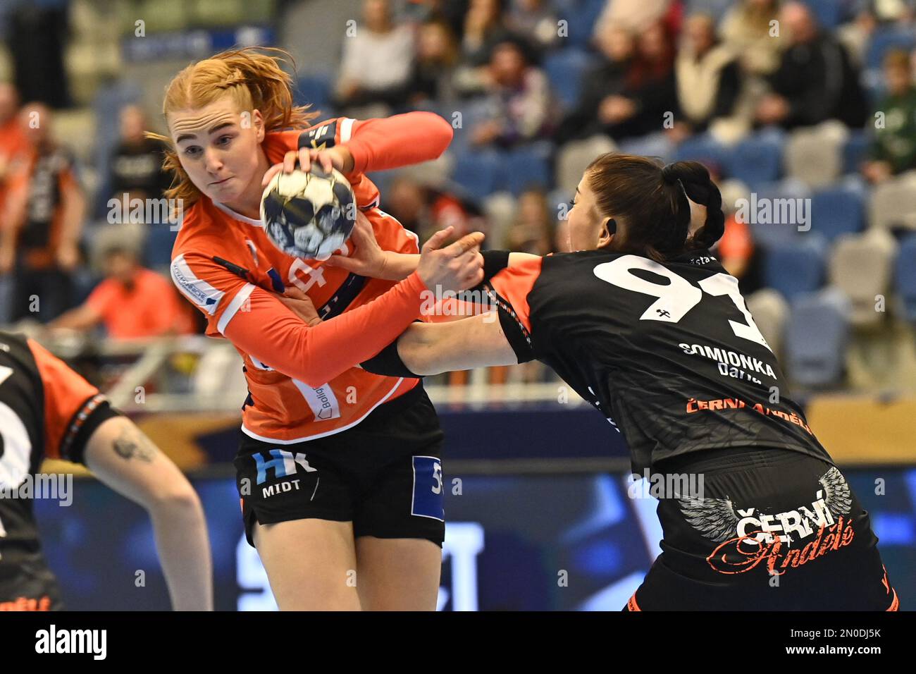 From left Dione Housheer of Odense and Daria Somionka of Most in action during the Women's handball Champions League 13 round Group 1 game: Most vs Odense in Chomutova, Czech Republic, February 5, 2023. (CTK Photo/Ondrej Hajek) Stock Photo