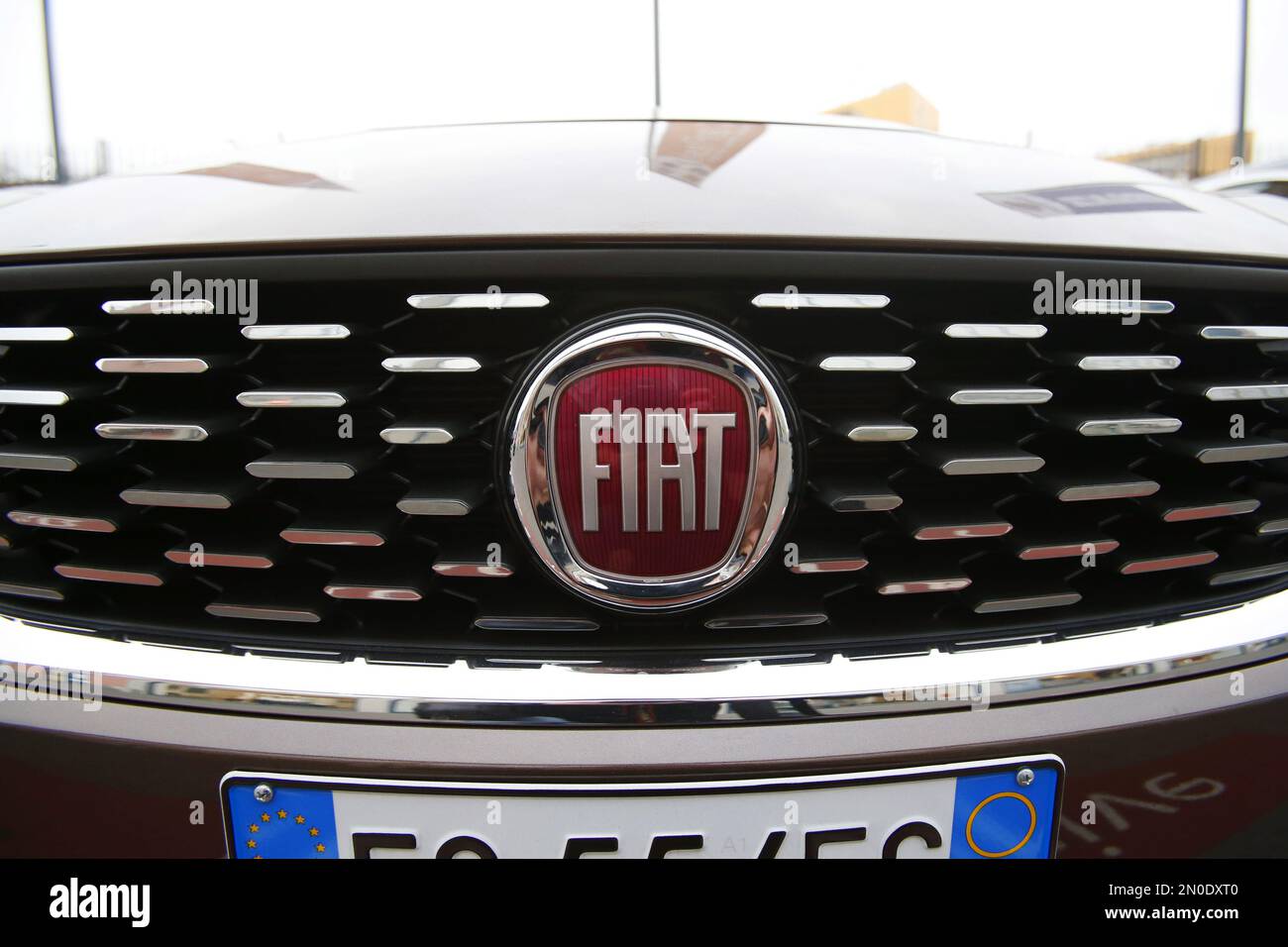 The Fiat logo is seen on a car on display in a car reseller in Milan,  Italy, Wednesday, Jan. 27, 2016. Carmaker Fiat Chrysler said Wednesday it  would revise its five-year business