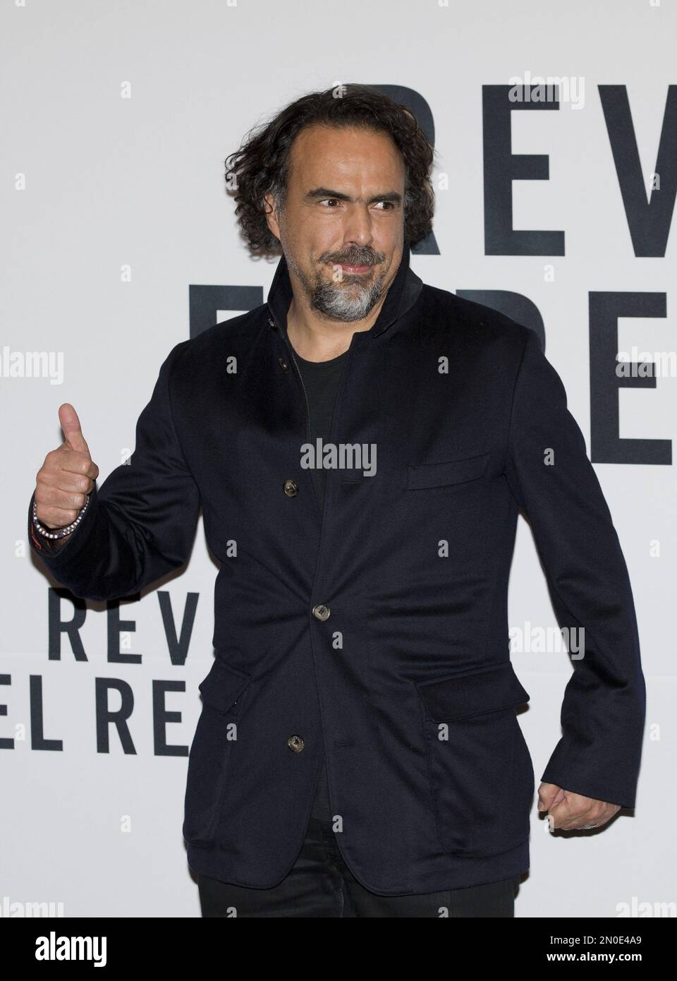 Director Alejandro Gonzalez Inarritu gives a thumbs up as he poses for ...