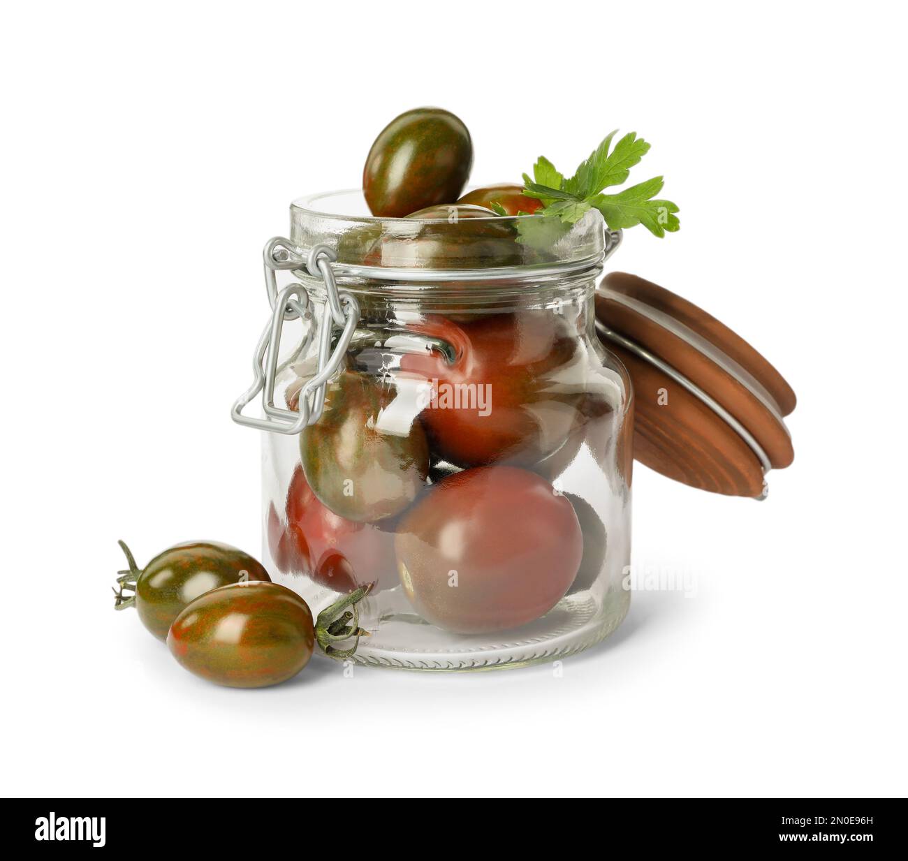 Pickling jar with fresh tomatoes isolated on white Stock Photo