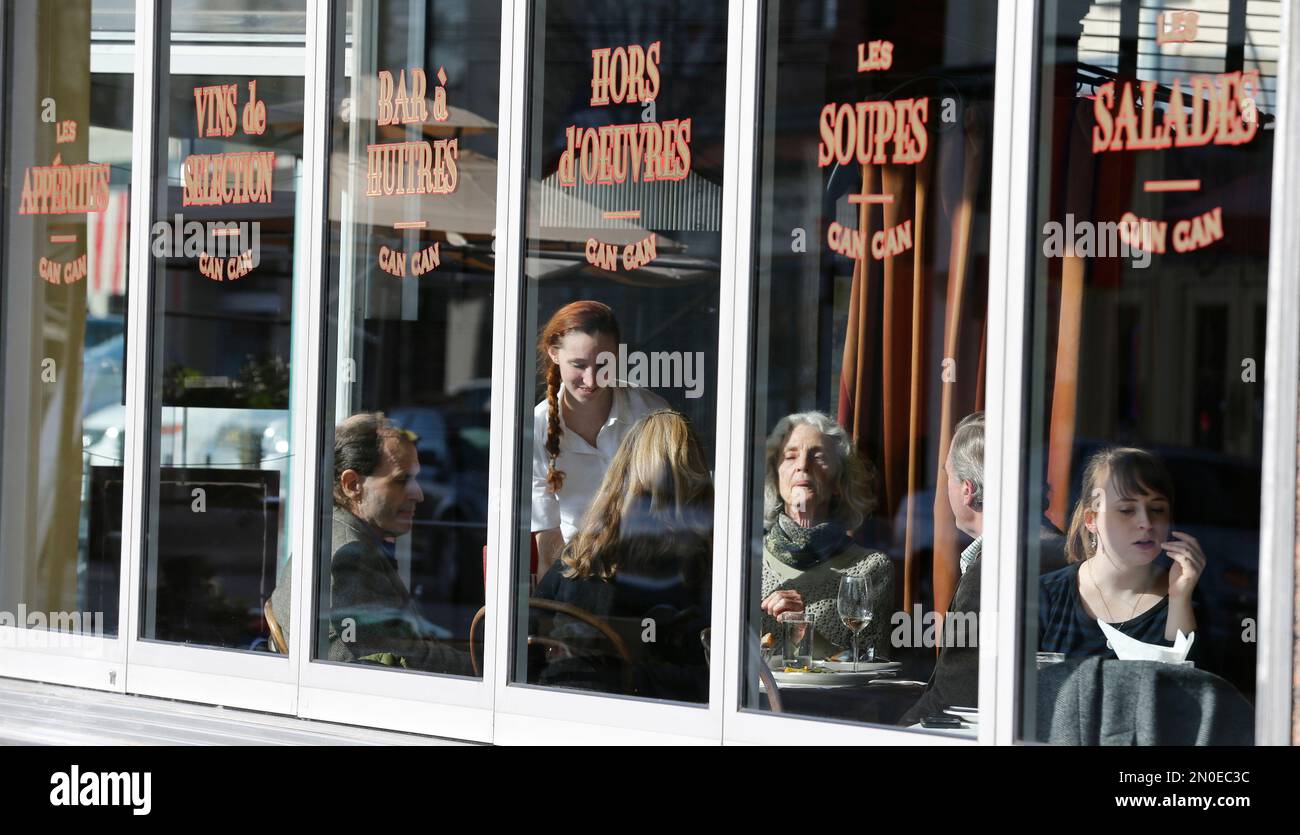 In this Jan. 20, 2016 photo, patrons enjoy lunch at Can Can Brasserie in  Carytown, a few miles west of downtown Richmond, Va. Restaurants offer a  range of ethnic cuisine and clothing