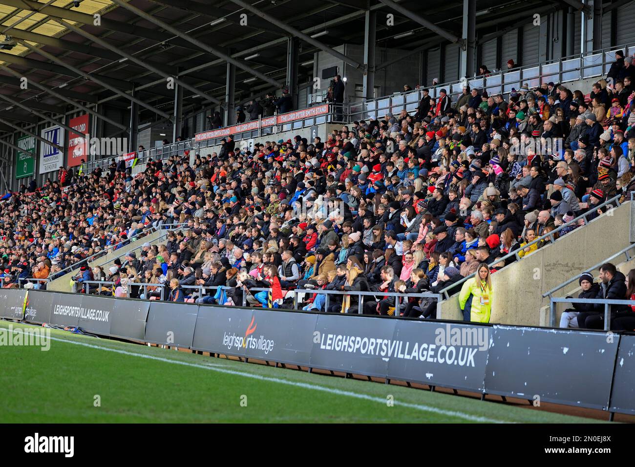 Large crowd supporting the WSL during the The FA Women's Super League match Manchester United Women vs Everton Women at Leigh Sports Village, Leigh, United Kingdom, 5th February 2023  (Photo by Conor Molloy/News Images) Stock Photo