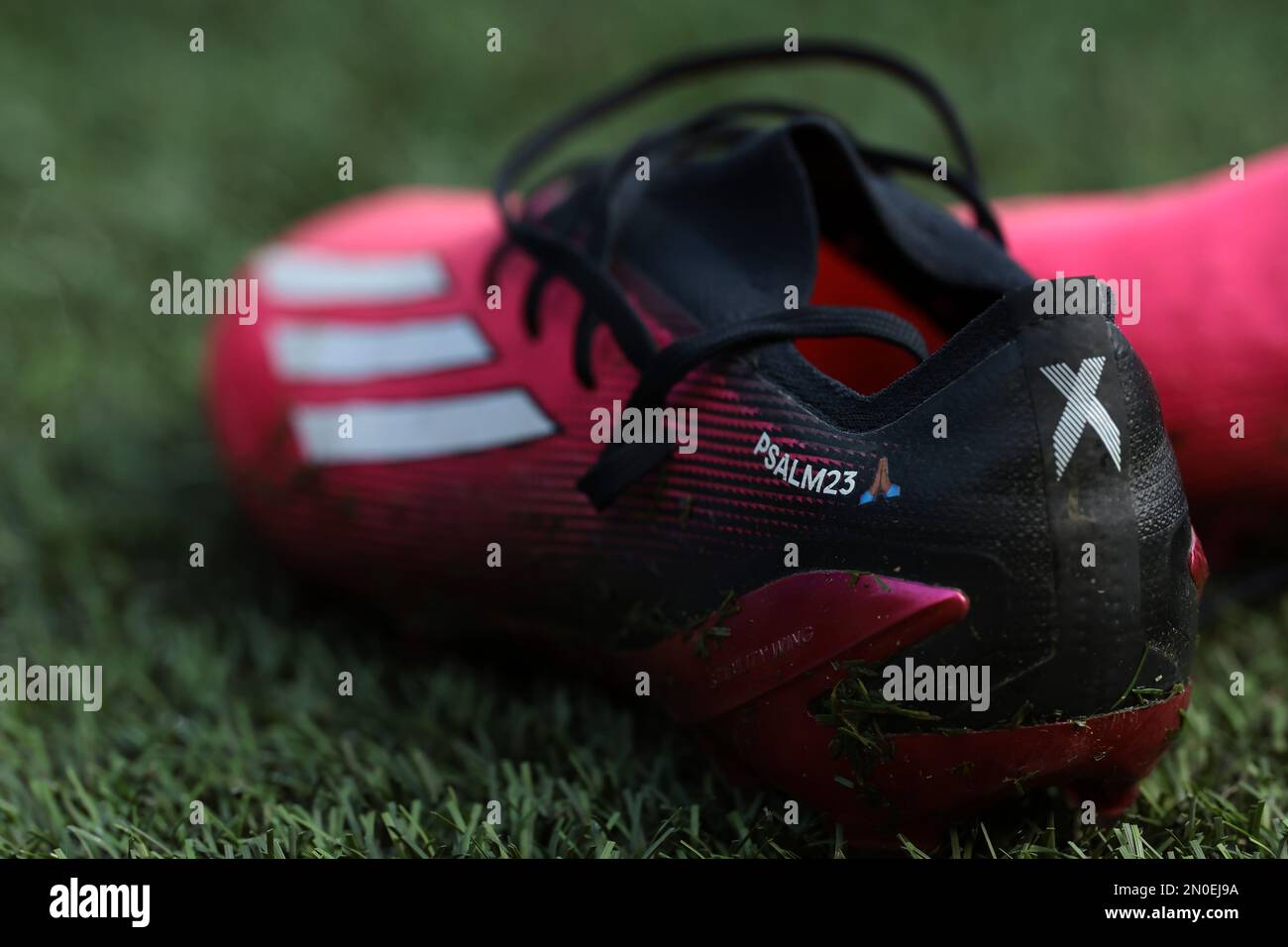 Turin, Italy, 5th February 2023. Kingsley Ehizibue of Udinese Calcio's  personalized Adidas football boots bearing a reference to Psalm 23 of the  Bible, seen prior to the Serie A match at Stadio