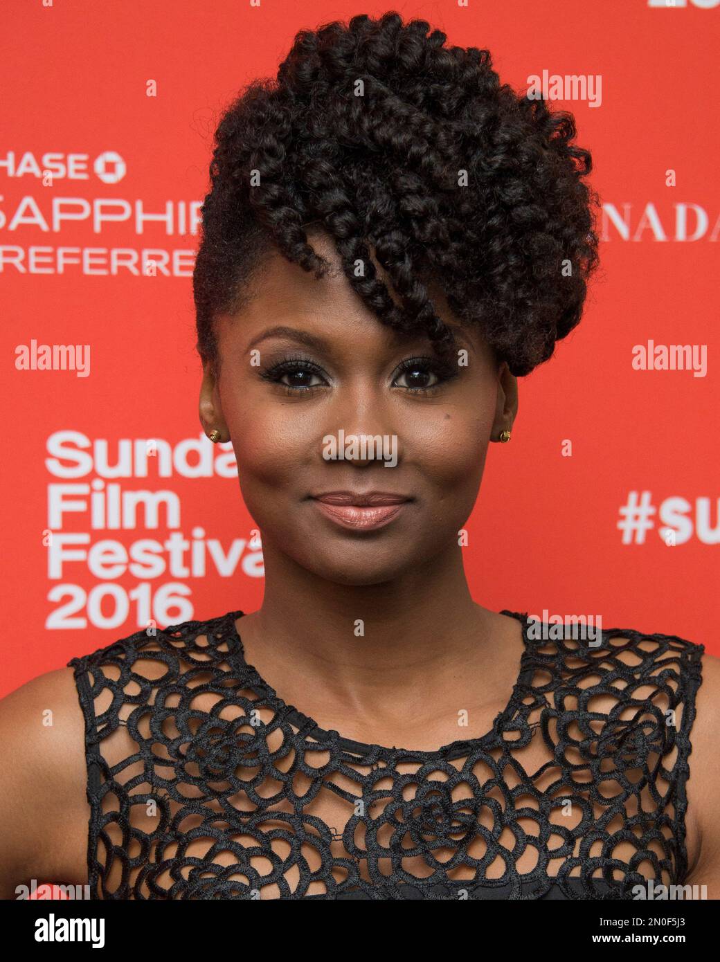 Actress Emayatzy Corinealdi poses at the premiere of "Miles Ahead