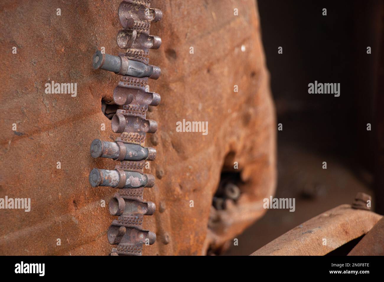 Exploded bullets in a cartridge belt inside an exploded Russian tank in