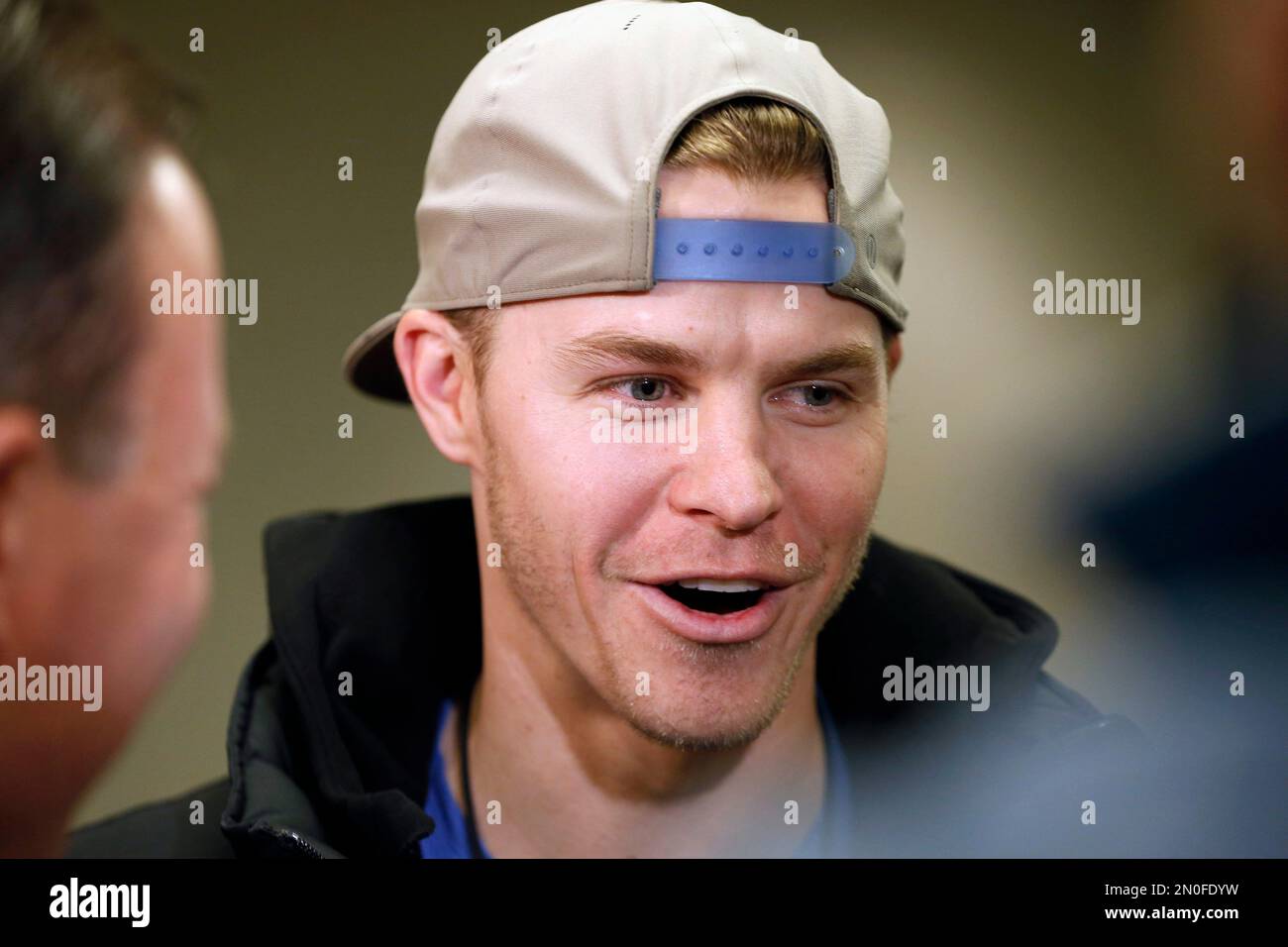 Boston Red Sox's Brock Holt talks with reporters prior to the Boston