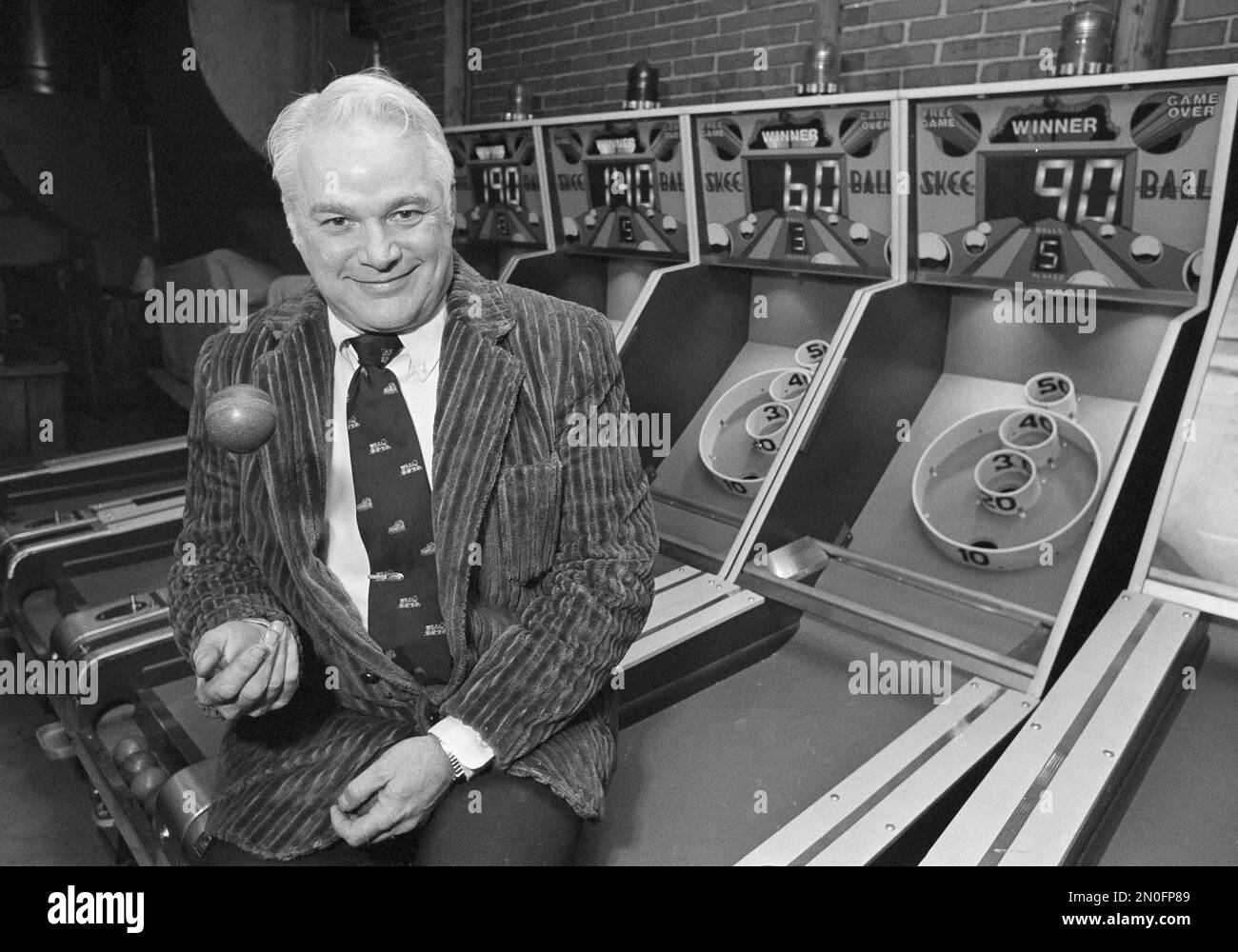 Samuel High tosses a SkeeBall at his Landsdale, Penn., headquarters of