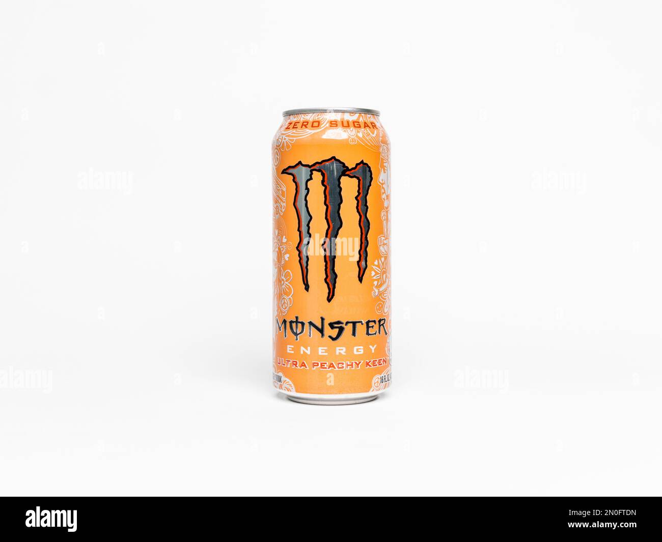 Monster Energy Ultra Peachy Keen beverage. Sugar free Monster energy drink can in a studio environment. Ice cold refreshment with caffeine. Stock Photo