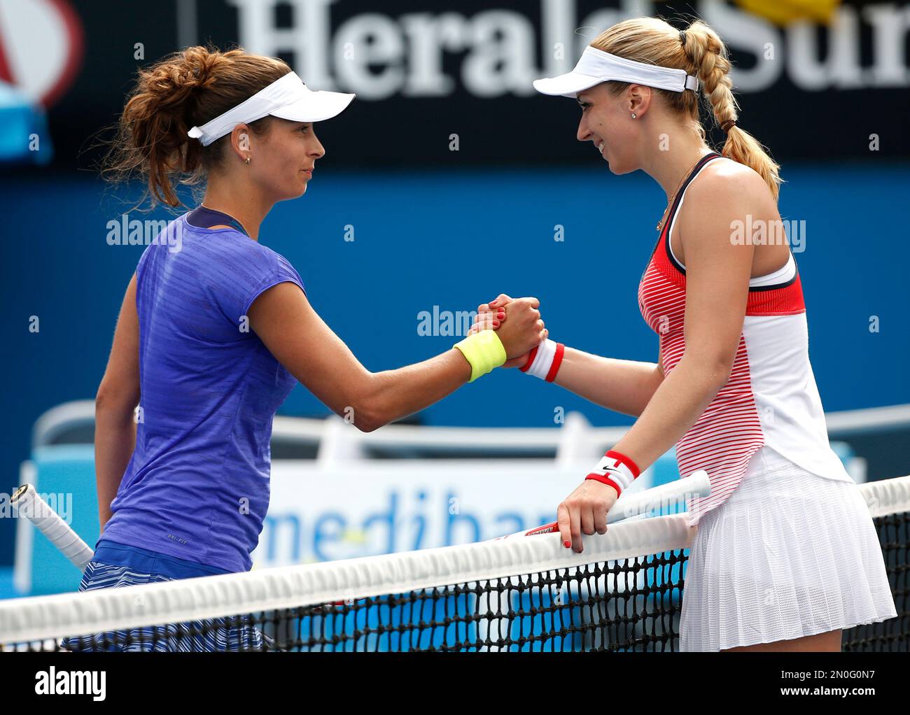 Sabine Lisicki, right, of Germany, right, is congratulated by Petra