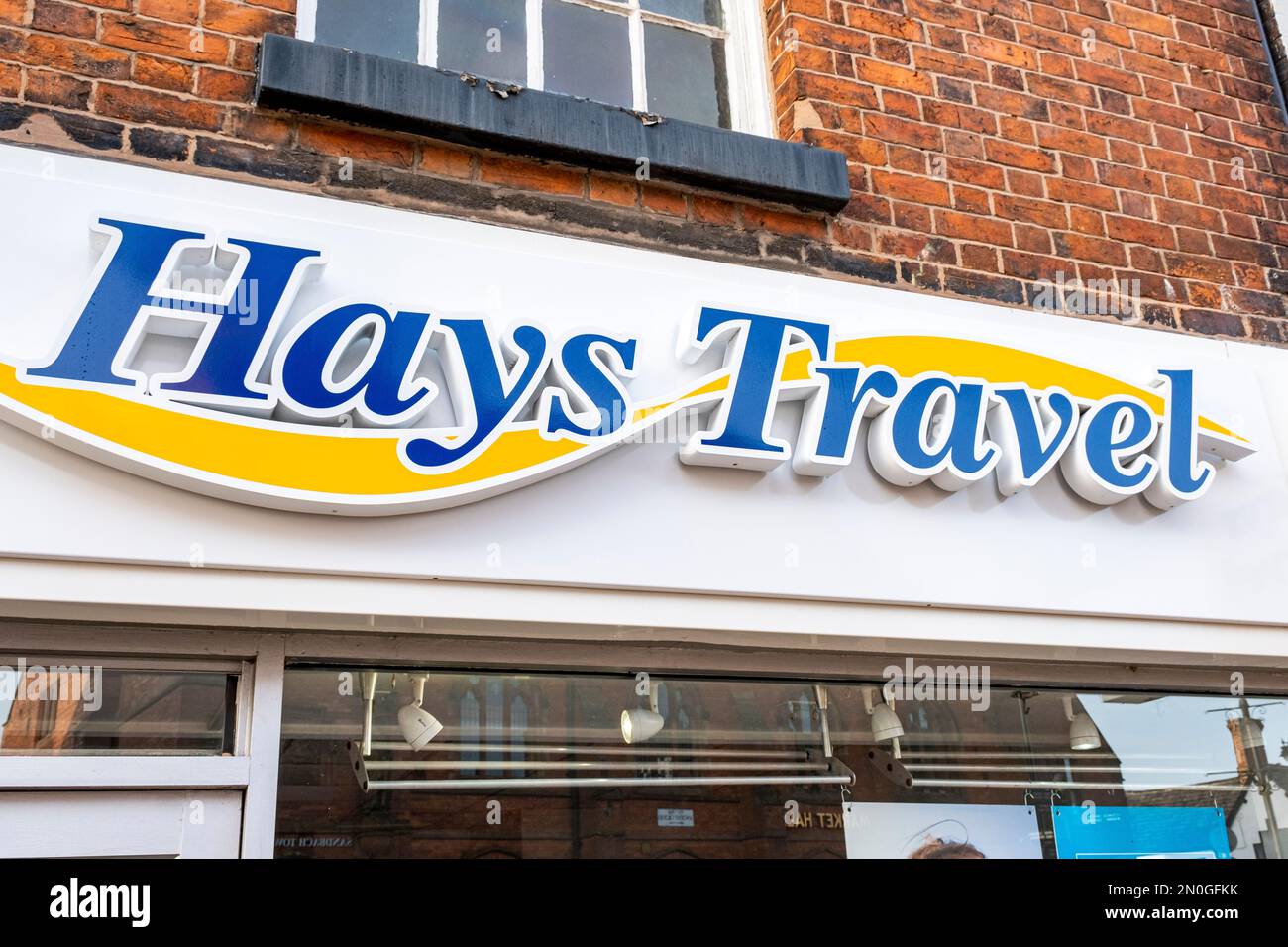 Hays Travel sign on outside wall UK Stock Photo
