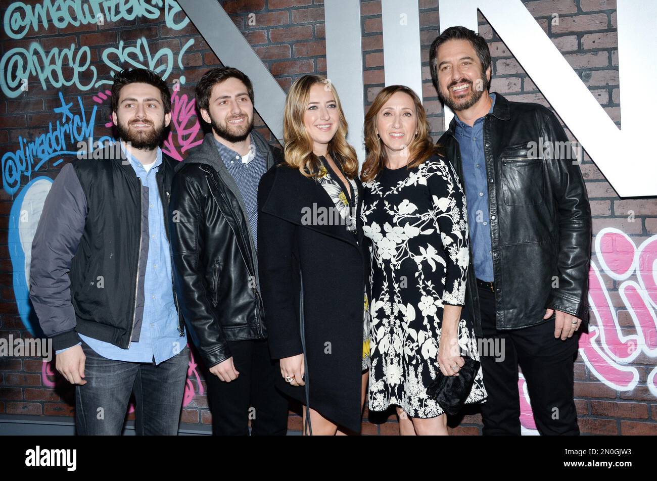Actor Ray Romano poses with his wife Anna and their children Gregory ...