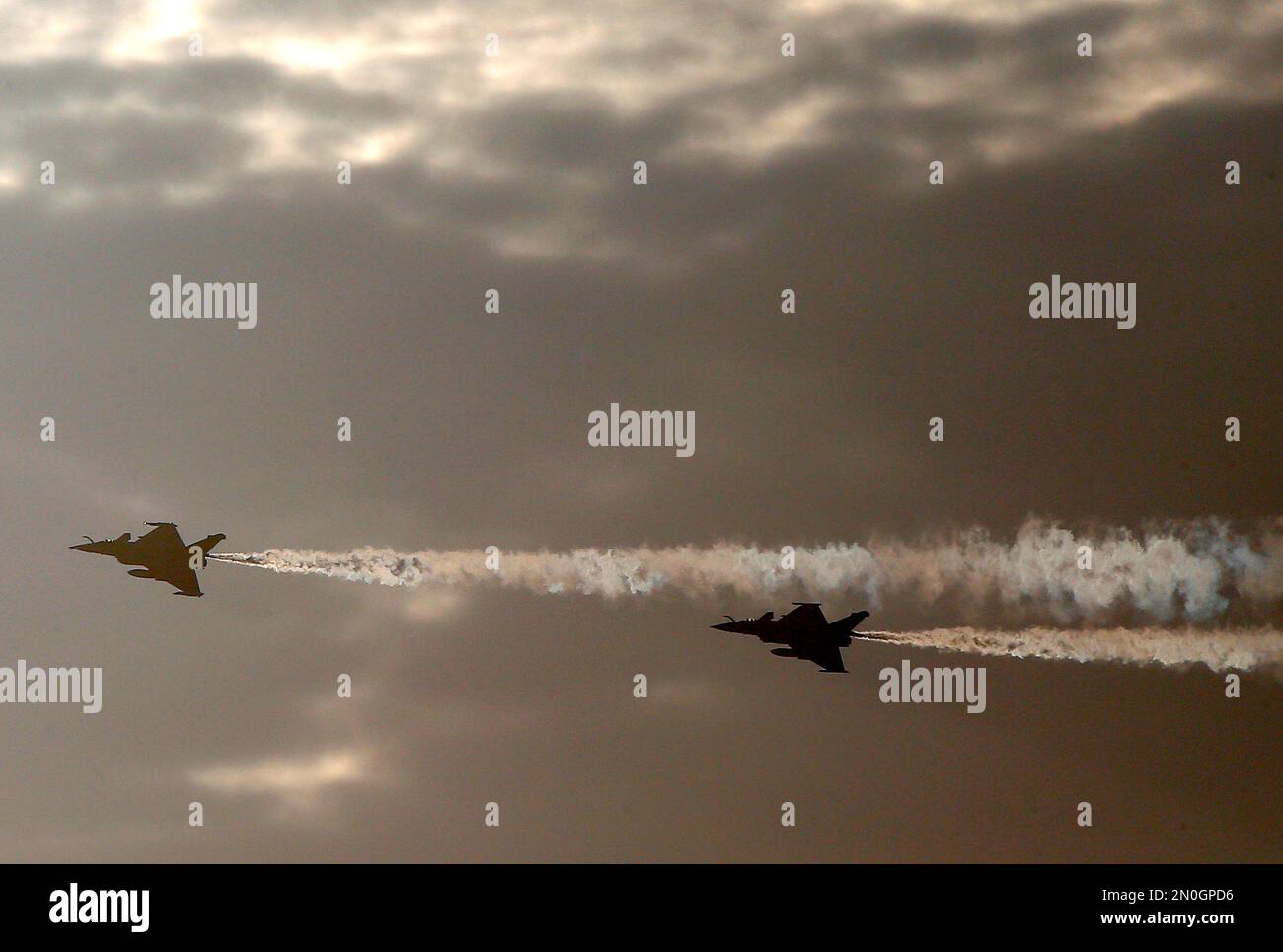 Rafale fighter jets dump fuel after a mission, before landing on France