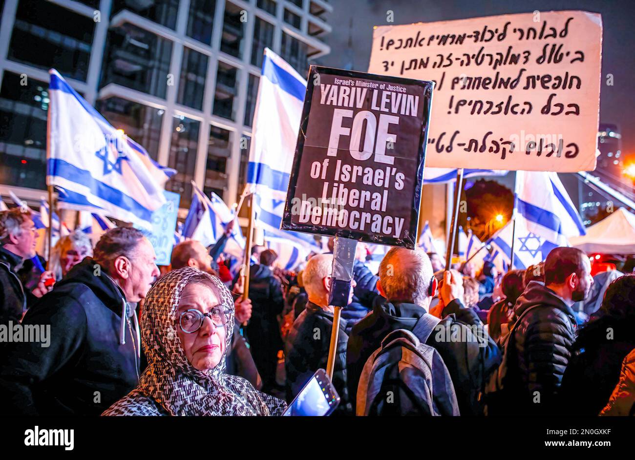 Tel Aviv, Israel. 04th Feb, 2023. A protester holds a placard expressing her opinion on Israel's minister of Justice Yariv Levin, during the demonstration. Thousands of protesters rally for Democracy in Tel Aviv for the Fifth Consecutive Week across Israel. Credit: SOPA Images Limited/Alamy Live News Stock Photo
