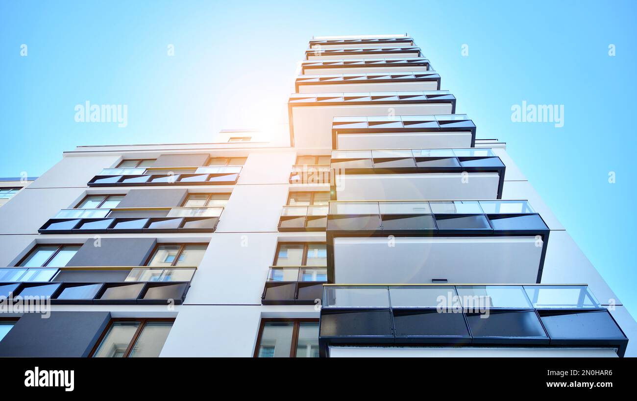 New apartment building with glass balconies. Modern architecture houses ...