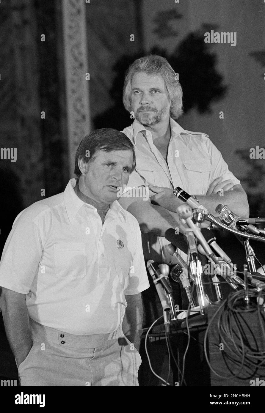 Ken Stabler - Snake leaves the field with Oilers head coach Ed Biles after  defeating the Rams 27-20 September 6, 1981 in Anaheim, California.